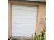 White garage door, providing ample storage space at 1510 Palmer Ct, Palm Harbor, FL 34685