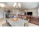 Open dining room adjacent to kitchen and living room at 15737 High Bell Pl, Bradenton, FL 34212