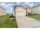 Two-story house with basketball hoop and driveway at 15737 High Bell Pl, Bradenton, FL 34212