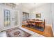 Formal dining room featuring hardwood floors and a wood table set at 19106 Cellini Pl, Lutz, FL 33558