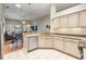 Bright kitchen features light wood cabinets, granite countertops, and stainless steel appliances at 19106 Cellini Pl, Lutz, FL 33558