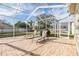 Spacious patio with lounge chairs and a grill for outdoor entertaining at 19106 Cellini Pl, Lutz, FL 33558