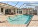 Refreshing pool with a screened enclosure and plenty of sun at 19106 Cellini Pl, Lutz, FL 33558