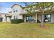 Spacious backyard with patio and beautiful lawn at 1950 Marlington Way, Clearwater, FL 33763