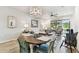 Charming dining area with a rustic table and seating for four at 1950 Marlington Way, Clearwater, FL 33763