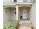 Inviting entryway leading into a spacious interior with hardwood floors at 1950 Marlington Way, Clearwater, FL 33763