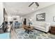 Bright and airy living room featuring a comfortable sofa and stylish rug at 1950 Marlington Way, Clearwater, FL 33763