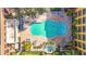 Overhead view of community pool, hot tub, and surrounding patio at 2010 E Palm Ave # 14304, Tampa, FL 33605