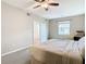 Spacious bedroom with a large bed and access to another room at 2010 E Palm Ave # 14304, Tampa, FL 33605