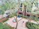 Community courtyard with trees, fountain, and seating at 2010 E Palm Ave # 14304, Tampa, FL 33605