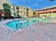 Resort-style pool with ample deck space and surrounding landscaping at 2010 E Palm Ave # 14304, Tampa, FL 33605