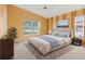 Bright bedroom with water views, and neutral decor at 217 Linger Ln, Sun City Center, FL 33573