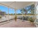 Relaxing screened patio overlooking a pond at 217 Linger Ln, Sun City Center, FL 33573