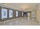 Spacious dining room with decorative wallpaper and chandelier at 217 Oceania Ct, Apollo Beach, FL 33572