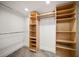 Spacious walk-in closet with ample shelving and hanging space at 224 Skiff Pt # 224, Clearwater Beach, FL 33767