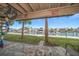 Relaxing patio with canal views and lush landscaping at 224 Skiff Pt # 224, Clearwater Beach, FL 33767