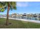 Stunning waterfront view with boats docked along the canal at 224 Skiff Pt # 224, Clearwater Beach, FL 33767