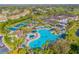 Aerial view of the community pool and clubhouse at 2241 Greenwich Dr # 68, Sun City Center, FL 33573