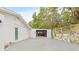 Detached garage with a cement slab at 2255 S Lagoon Cir, Clearwater, FL 33765