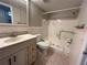 Bathroom features a vanity, toilet, tub, and shower at 2449 Columbia Dr # 55, Clearwater, FL 33763