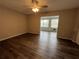 Living room with ceiling fan and an open floor plan at 2449 Columbia Dr # 55, Clearwater, FL 33763