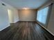 Living room with dark vinyl flooring at 2449 Columbia Dr # 55, Clearwater, FL 33763