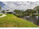 Scenic pond with gazebo and walking path at 2449 Columbia Dr # 55, Clearwater, FL 33763