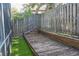 Wooden deck and fenced backyard, perfect for outdoor enjoyment at 2577 Estancia Blvd, Clearwater, FL 33761