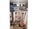 Well-organized closet with ample hanging and shelf space at 2577 Estancia Blvd, Clearwater, FL 33761