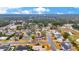 Aerial view of a single-Gathering home on a tree-lined street at 2901 Forestwood Dr, Seffner, FL 33584