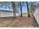 Large backyard with mature trees and fence at 2901 Forestwood Dr, Seffner, FL 33584