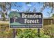 Entrance sign for Brandon Forest, a deed restricted community at 2901 Forestwood Dr, Seffner, FL 33584