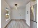 Dining area with wood-look floors and large window at 2901 Forestwood Dr, Seffner, FL 33584