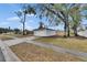 Detached garage with new paint and driveway at 2901 Forestwood Dr, Seffner, FL 33584