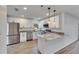 Modern kitchen with white cabinets and granite countertops at 2901 Forestwood Dr, Seffner, FL 33584