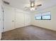 Bedroom with double closets and carpet at 3005 Enisglen Dr, Palm Harbor, FL 34683