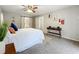 Main bedroom with barn door to en-suite bathroom at 3005 Enisglen Dr, Palm Harbor, FL 34683