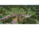 Aerial view of clubhouse and golf course at 3147 Hyde Park Dr, Clearwater, FL 33761