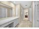 Vanity area with a large mirror and access to the bathroom at 3147 Hyde Park Dr, Clearwater, FL 33761