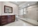 Modern bathroom with a walk-in shower and updated fixtures at 3147 Hyde Park Dr, Clearwater, FL 33761