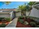 Landscaped walkway leading to house entrance at 3147 Hyde Park Dr, Clearwater, FL 33761