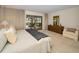 Main bedroom with pool view and access, featuring ample space at 3147 Hyde Park Dr, Clearwater, FL 33761