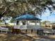 Hexagonal gazebo with benches and landscaping at 36905 Kay Ave, Zephyrhills, FL 33542