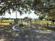 Enjoy a relaxing game of mini golf under the shade of large oak trees at 36905 Kay Ave, Zephyrhills, FL 33542