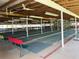 Indoor shuffleboard courts with multiple lanes at 36905 Kay Ave, Zephyrhills, FL 33542