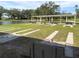 Outdoor shuffleboard courts with covered seating at 36905 Kay Ave, Zephyrhills, FL 33542