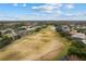 Aerial view of homes and open green space at 4337 Waterford Landing Dr, Lutz, FL 33558