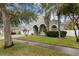 House exterior showcasing a large front yard, driveway, and walkway at 4337 Waterford Landing Dr, Lutz, FL 33558