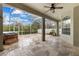 Spacious screened patio with hot tub and tile floor at 4337 Waterford Landing Dr, Lutz, FL 33558