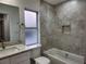 Clean bathroom with a bathtub, shower, and modern vanity at 5211 Peach Ave, Seffner, FL 33584